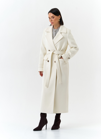 Женское пальто белого цвета